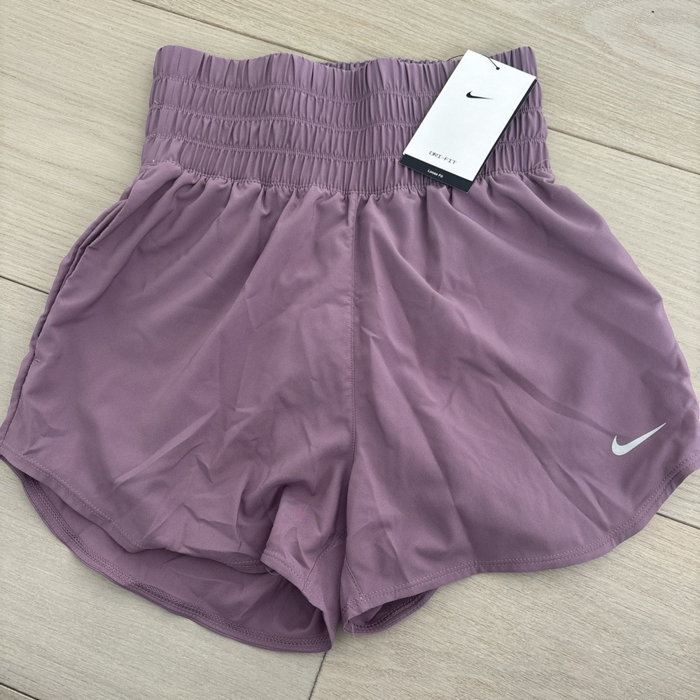 Purple high waist Nike shorts